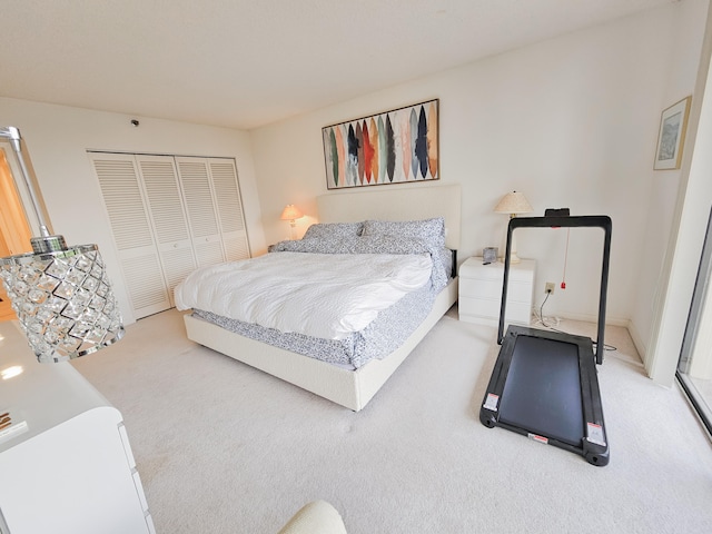 carpeted bedroom featuring a closet