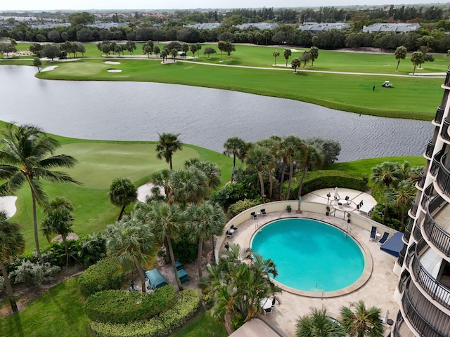 view of pool featuring a water view