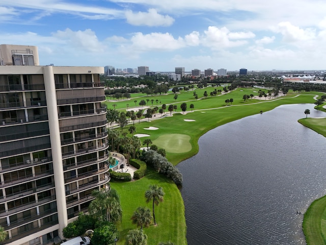 surrounding community featuring a water view