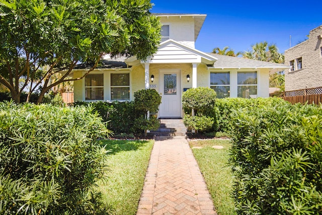 view of front of house with a front lawn