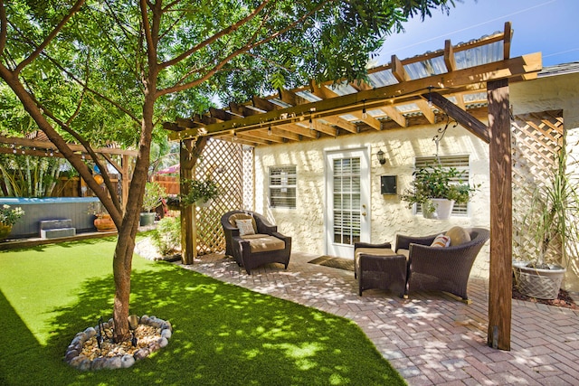 view of patio with an outdoor living space and a pergola