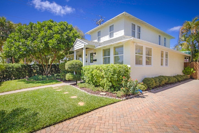 view of front of home with a front yard