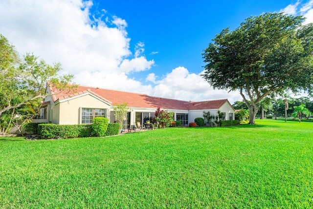 exterior space with a front yard