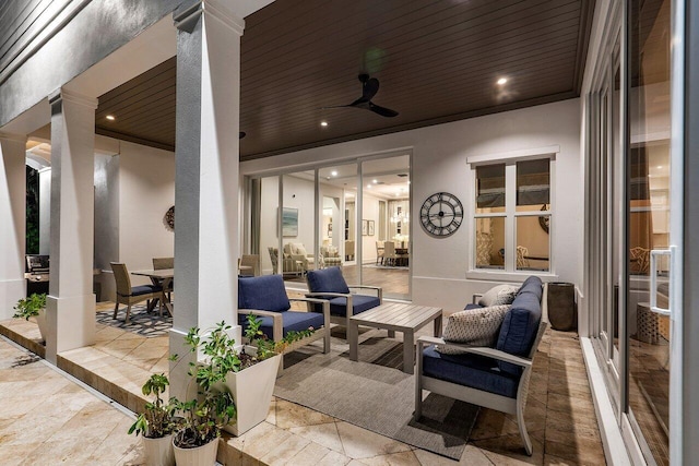 view of patio with outdoor lounge area and ceiling fan