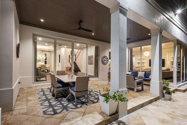 view of patio with ceiling fan and an outdoor hangout area