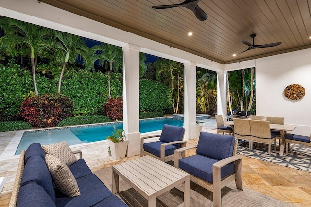 view of patio / terrace with an outdoor living space and ceiling fan