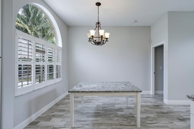 dining room featuring a notable chandelier