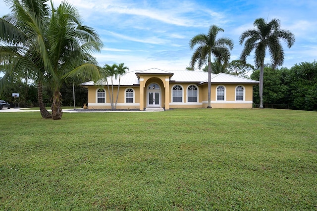 ranch-style house with a front lawn