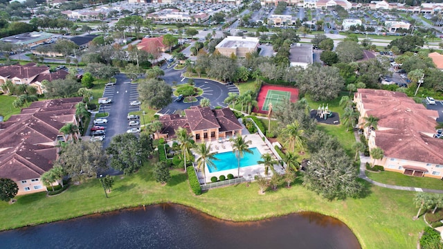 drone / aerial view with a water view