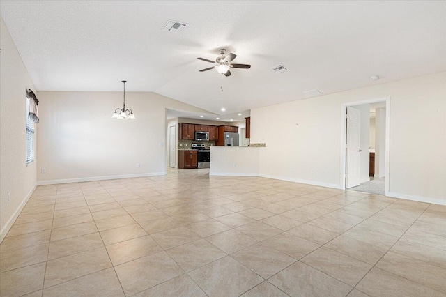 unfurnished living room with light tile patterned floors, ceiling fan with notable chandelier, and vaulted ceiling