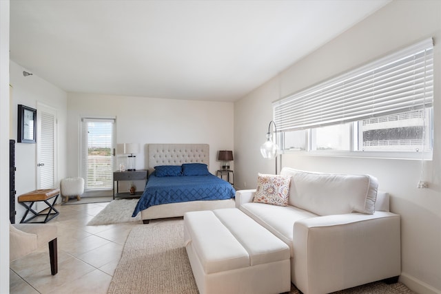 bedroom featuring light tile patterned floors