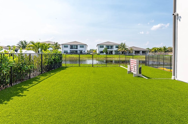 view of yard featuring a water view