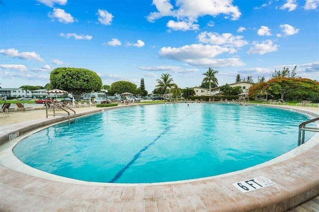 view of pool featuring a patio area