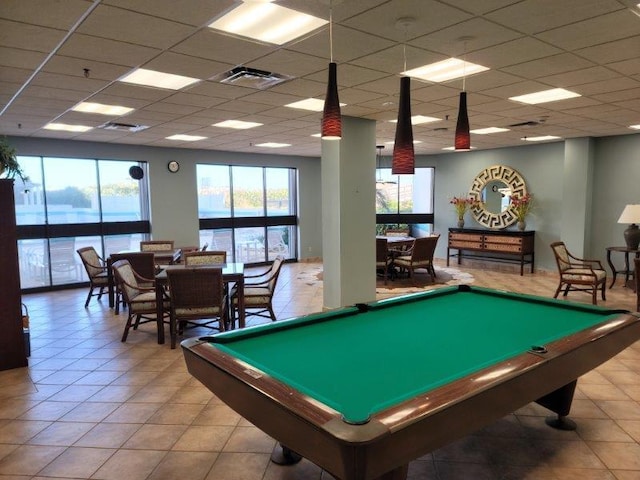 game room featuring a drop ceiling, light tile patterned flooring, and pool table