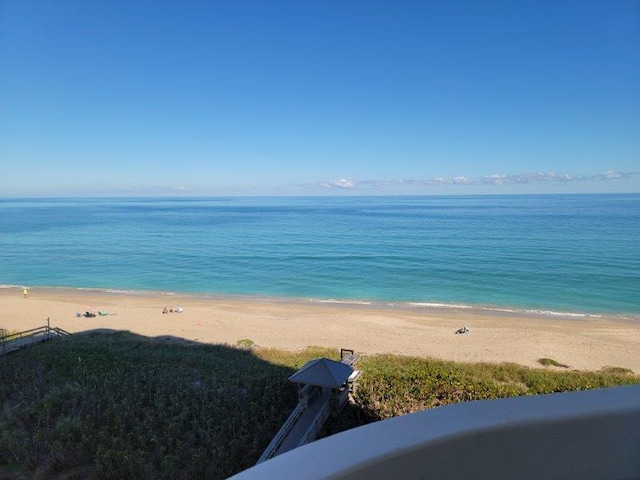 property view of water with a beach view