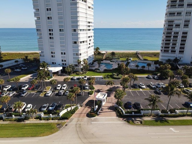 birds eye view of property featuring a water view