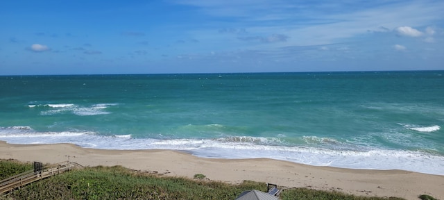 view of water feature with a view of the beach