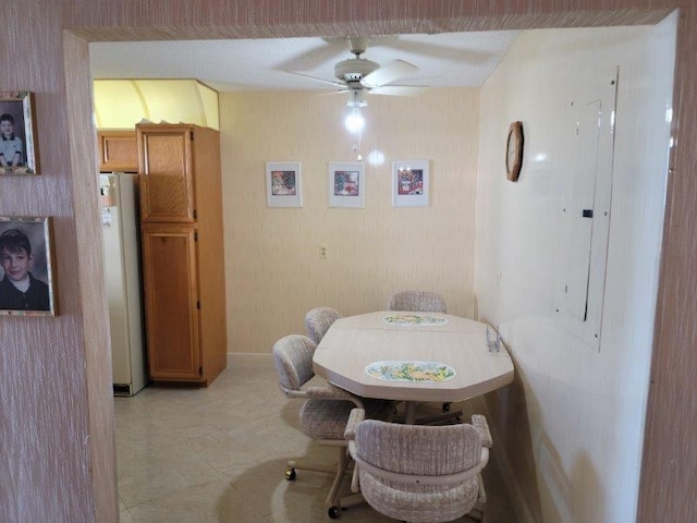 dining space featuring ceiling fan