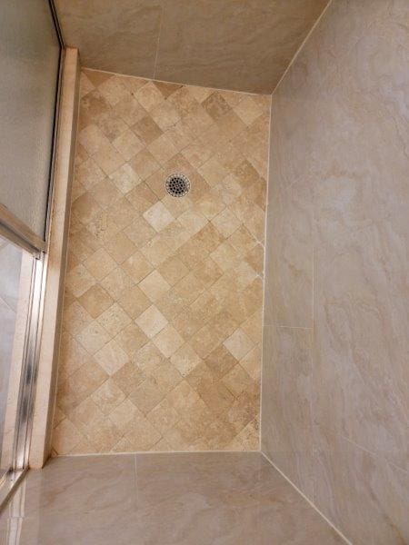 bathroom featuring walk in shower