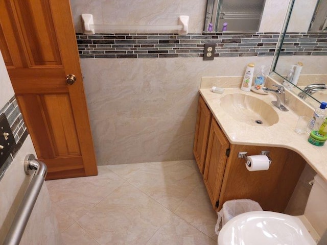 bathroom featuring tile patterned floors and vanity