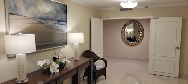 office area with visible vents, baseboards, and crown molding