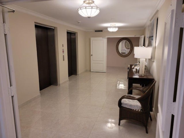 corridor featuring elevator, visible vents, and crown molding