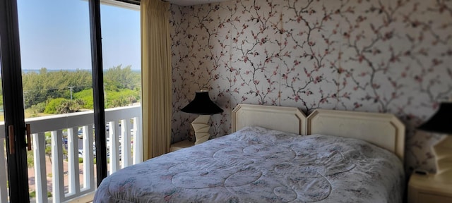 bedroom featuring wallpapered walls