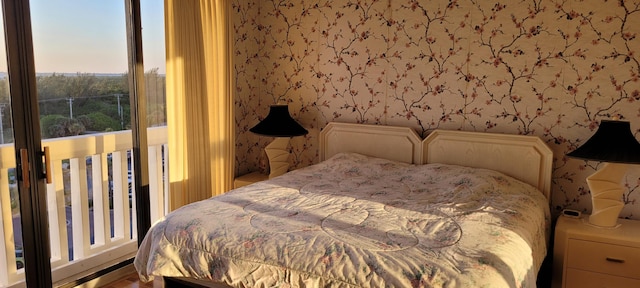 bedroom featuring wallpapered walls