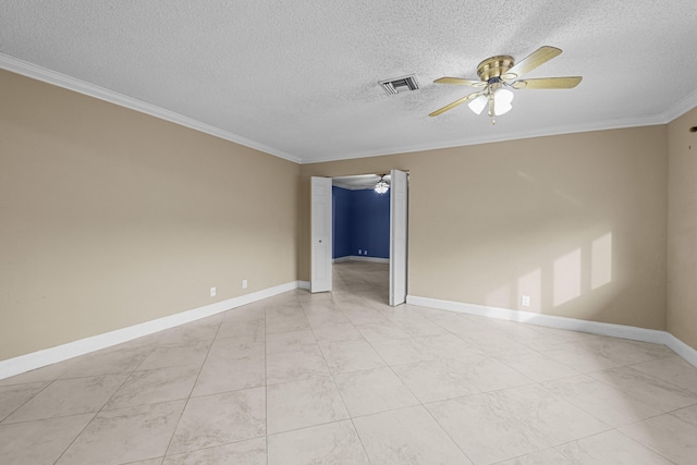 empty room featuring ceiling fan, crown molding, and a textured ceiling