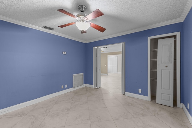 unfurnished bedroom featuring a textured ceiling, a closet, ceiling fan, and ornamental molding