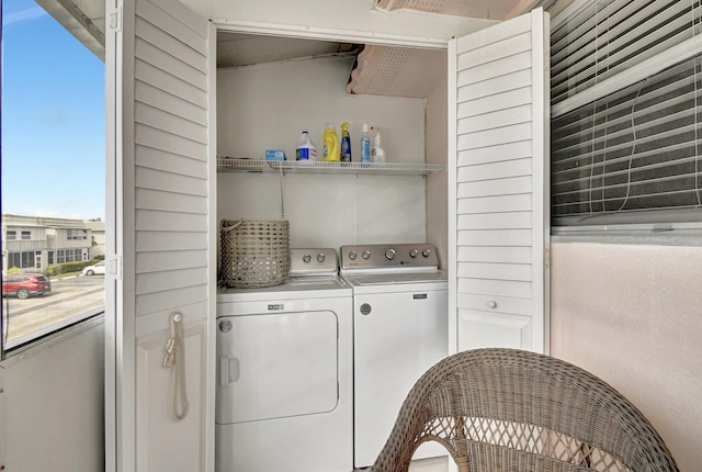 laundry room with washing machine and dryer