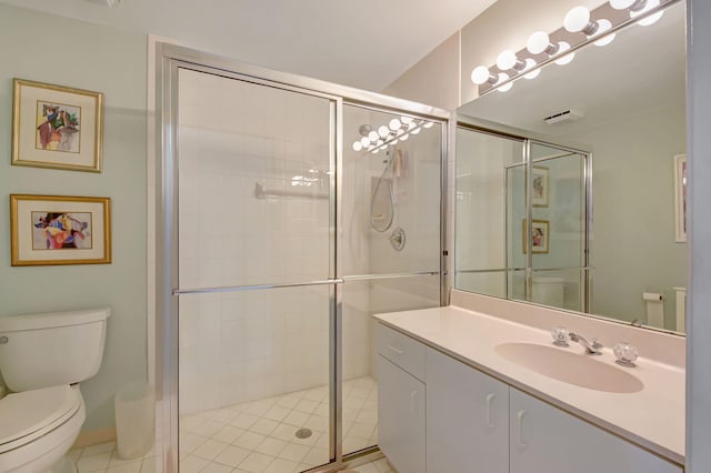 full bathroom featuring toilet, a shower stall, and vanity