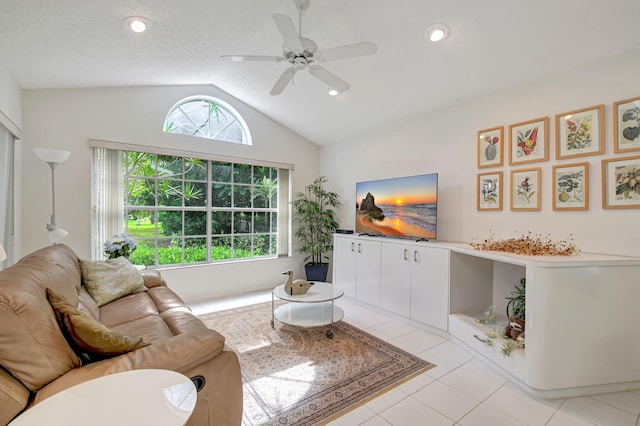 living room with a ceiling fan, lofted ceiling, recessed lighting, and light tile patterned floors