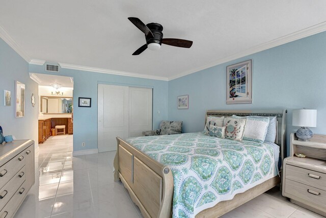 5750 Camino Del Sol Unit 102, Boca Raton, FL 33433 - bedroom featuring crown molding, light tile patterned flooring, ceiling fan, visible vents, and a closet