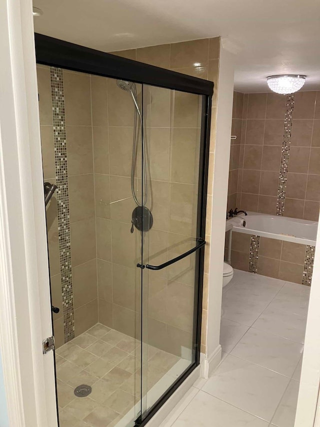 bathroom with separate shower and tub, tile patterned flooring, and toilet