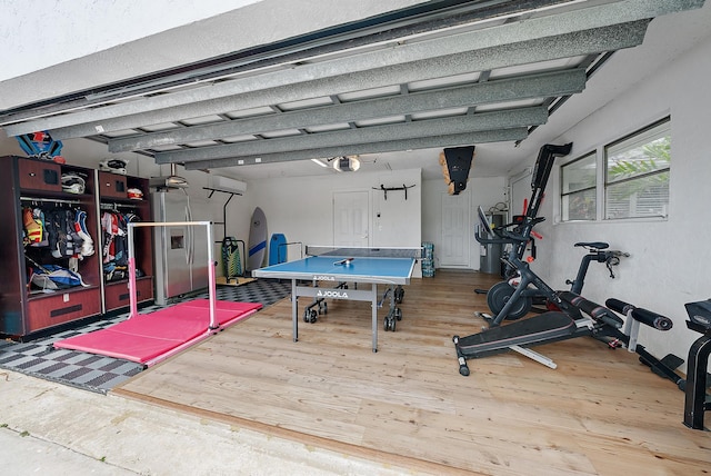 recreation room featuring hardwood / wood-style flooring