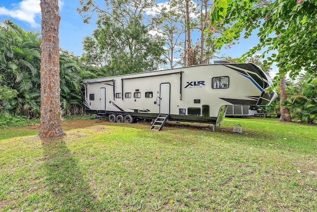 exterior space with a front yard