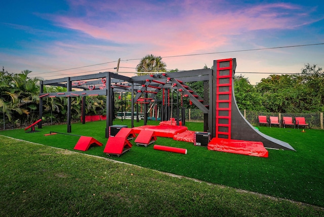 playground at dusk with a yard