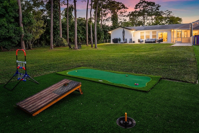 surrounding community with outdoor lounge area and a patio