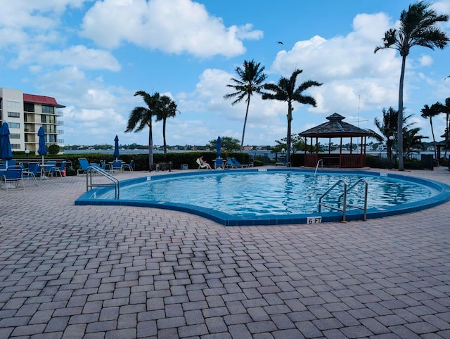 view of pool featuring a gazebo and a patio area