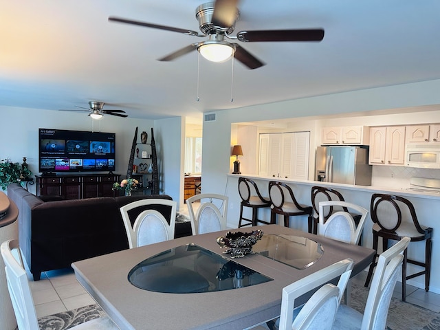 view of tiled dining space