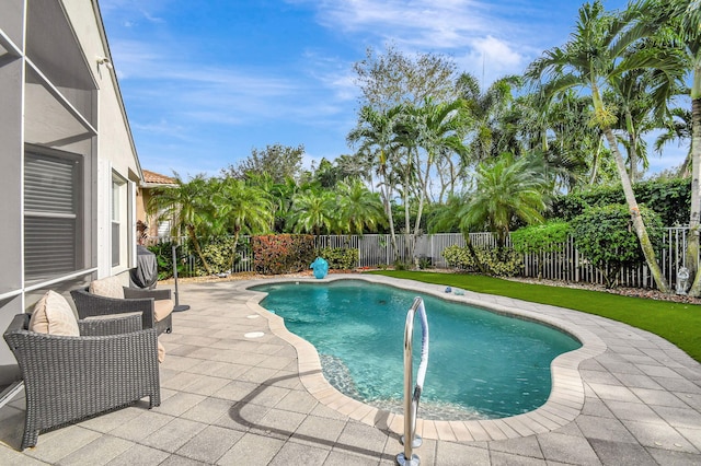 view of pool featuring a patio area