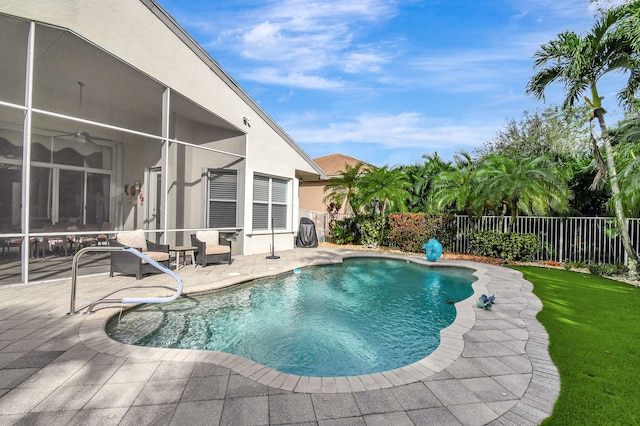 view of swimming pool with a patio area and a yard