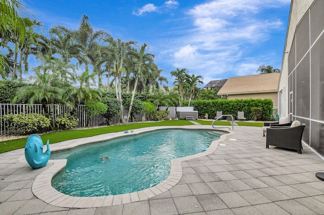 view of swimming pool featuring a patio