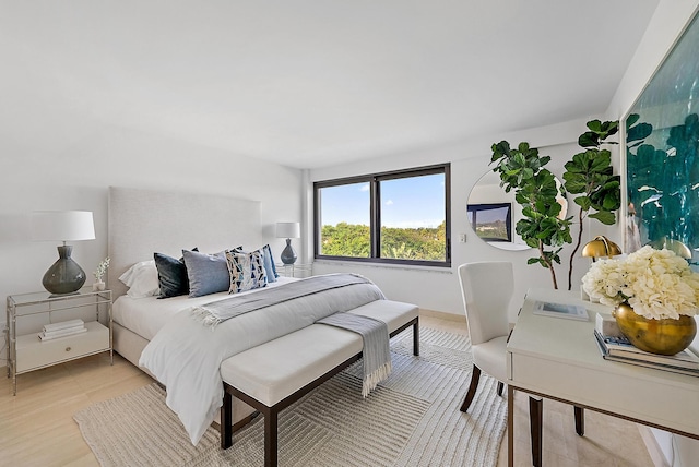 bedroom with light hardwood / wood-style floors