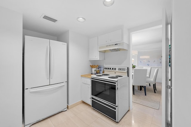 kitchen with white cabinetry, light tile patterned floors, white appliances, and custom exhaust hood