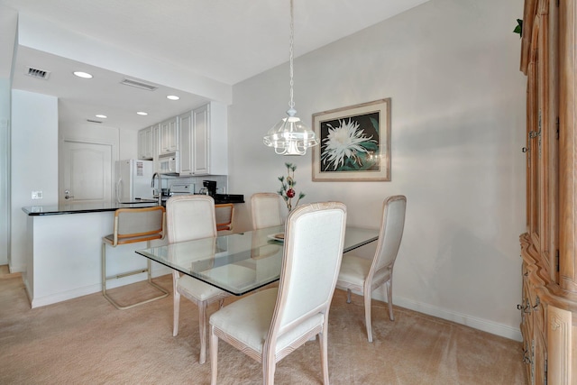 view of carpeted dining room