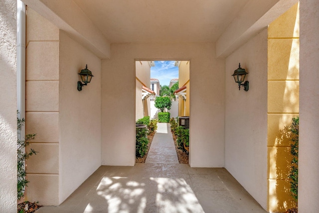 entrance to property featuring a patio area