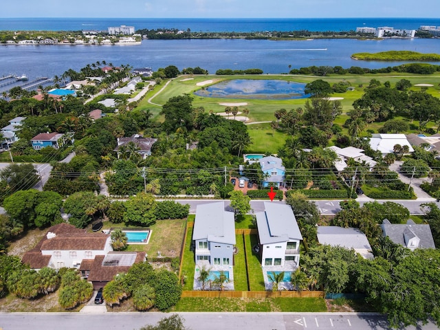 birds eye view of property featuring a water view