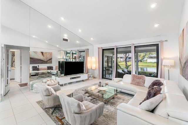 tiled living room with high vaulted ceiling